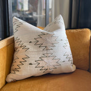 Pastel Pink and Purple Southwestern - baby blueNATIVEneed verificationHUNTEDFOX - Pastel Pink and Purple Southwestern - baby bluePastelsPillowsHUNTEDFOX - light colored boho throw pillow with southwestern design sitting on a gold club chair