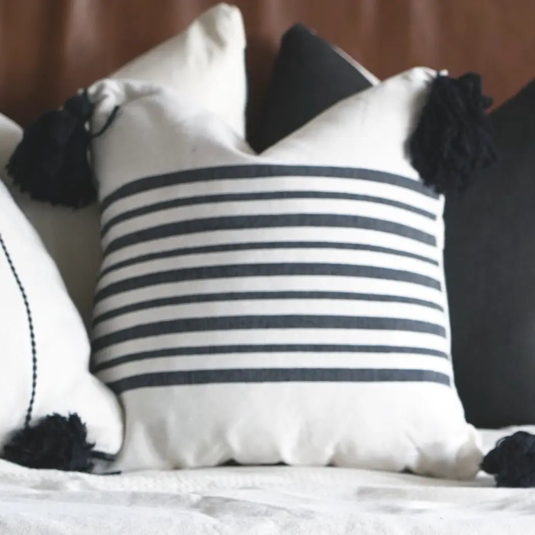black-and-white-striped-pillow-with-tassels