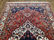 Semi Antique Persian Bakhtiari Rug, Hand-Knotted, Wool, Red, Midnight Blue, Ivory, Floral Medallion, 5'1" x 8' 6"