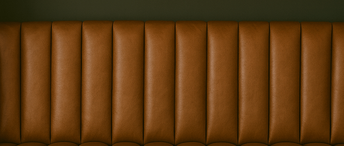 Overstuffed leather banquette – custom retro dining nook seating - custom banquette seatingH|F Atelierluxury upholstered seatingHUNTEDFOX - Overstuffed leather banquette – custom retro dining nook seating