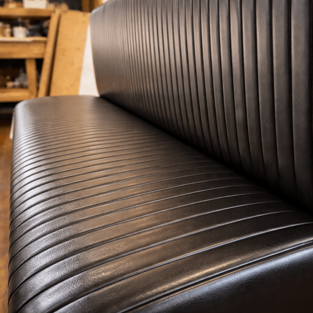 Ribbed Black Leather Banquette - custom banquette seatingH|F Atelierluxury upholstered seatingHUNTEDFOX - Ribbed Black Leather Banquette