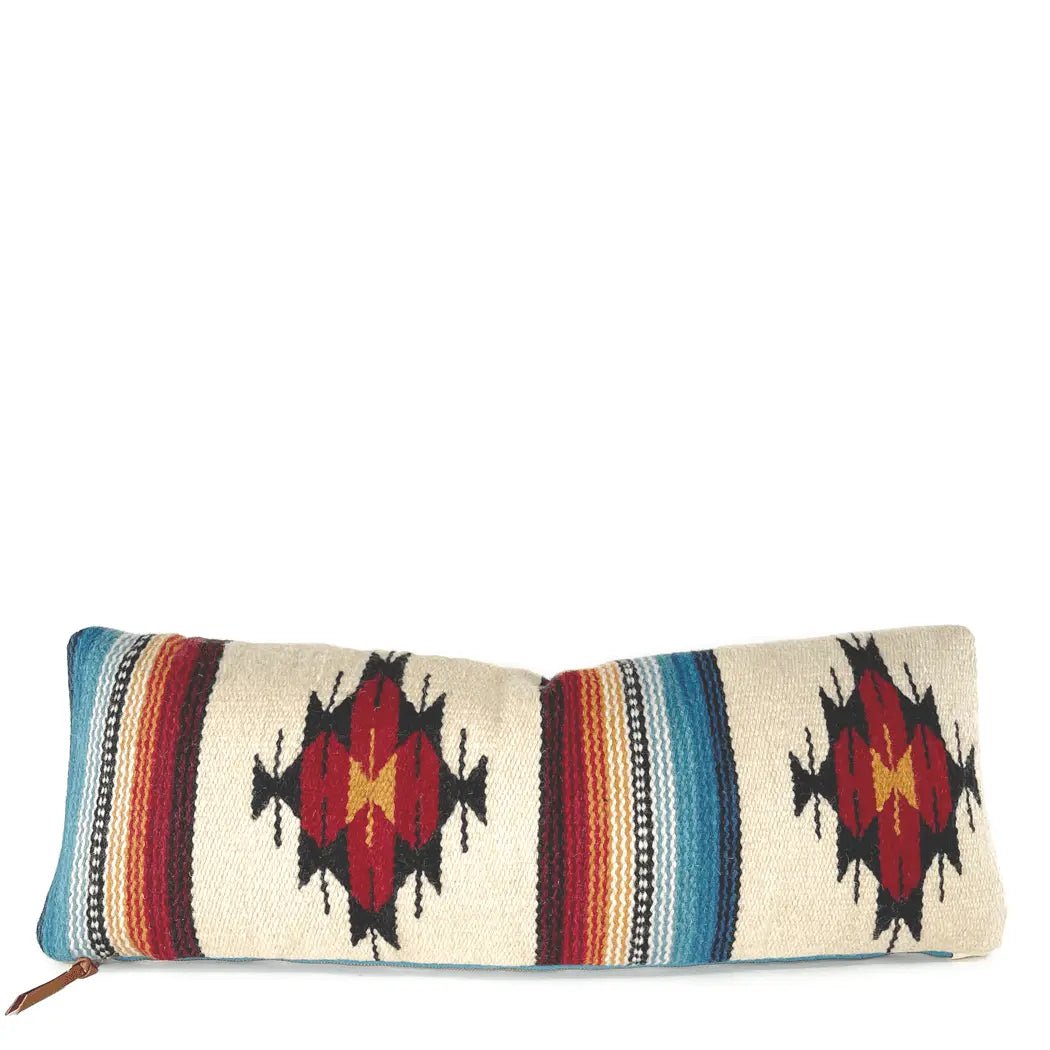 Handwoven Southwestern lumbar pillow with red, turquoise, and cream Navajo-style geometric pattern
