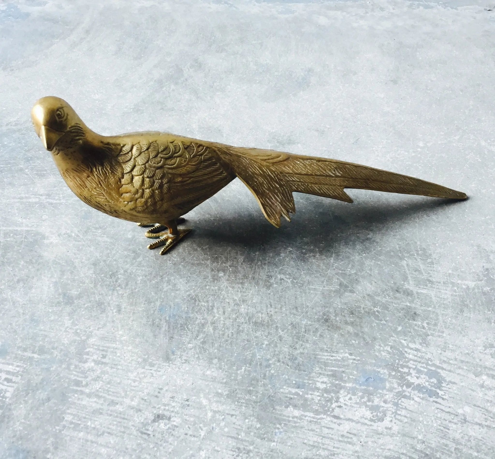 Mid-century modern vintage brass pheasant statue with long tail and etched feathers, bird figurine for home or office decor